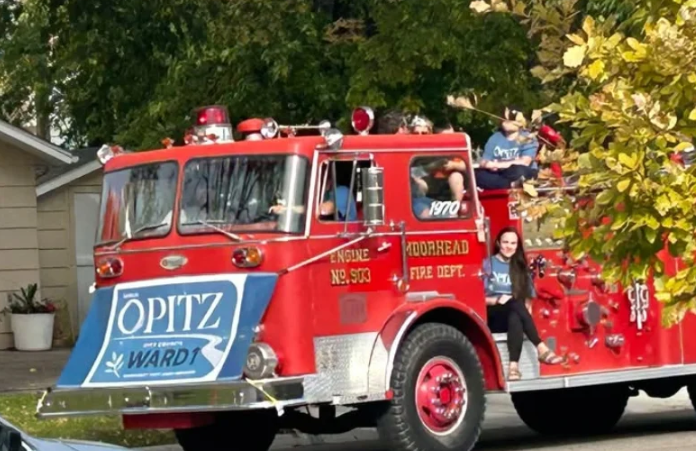 Moorhead City Council candidate Sarah Opitz’s use of fire truck during parade goes to a hearing — Crosby Government news